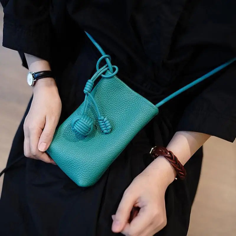 Women's Mini PU Leather Crossbody Phone Bag with Ball Pendant
