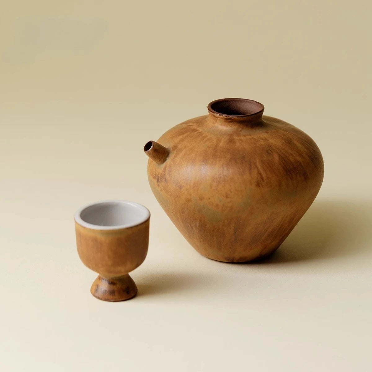 A Set of Simple Earthenware Drinking Utensils for One Person A Decanter A Ceramic Kiln-changed Wine Pot and Wine Cups Oasis Select