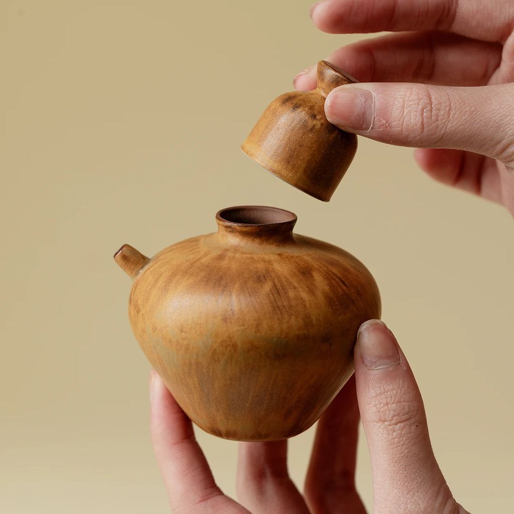 A Set of Simple Earthenware Drinking Utensils for One Person A Decanter A Ceramic Kiln-changed Wine Pot and Wine Cups Oasis Select