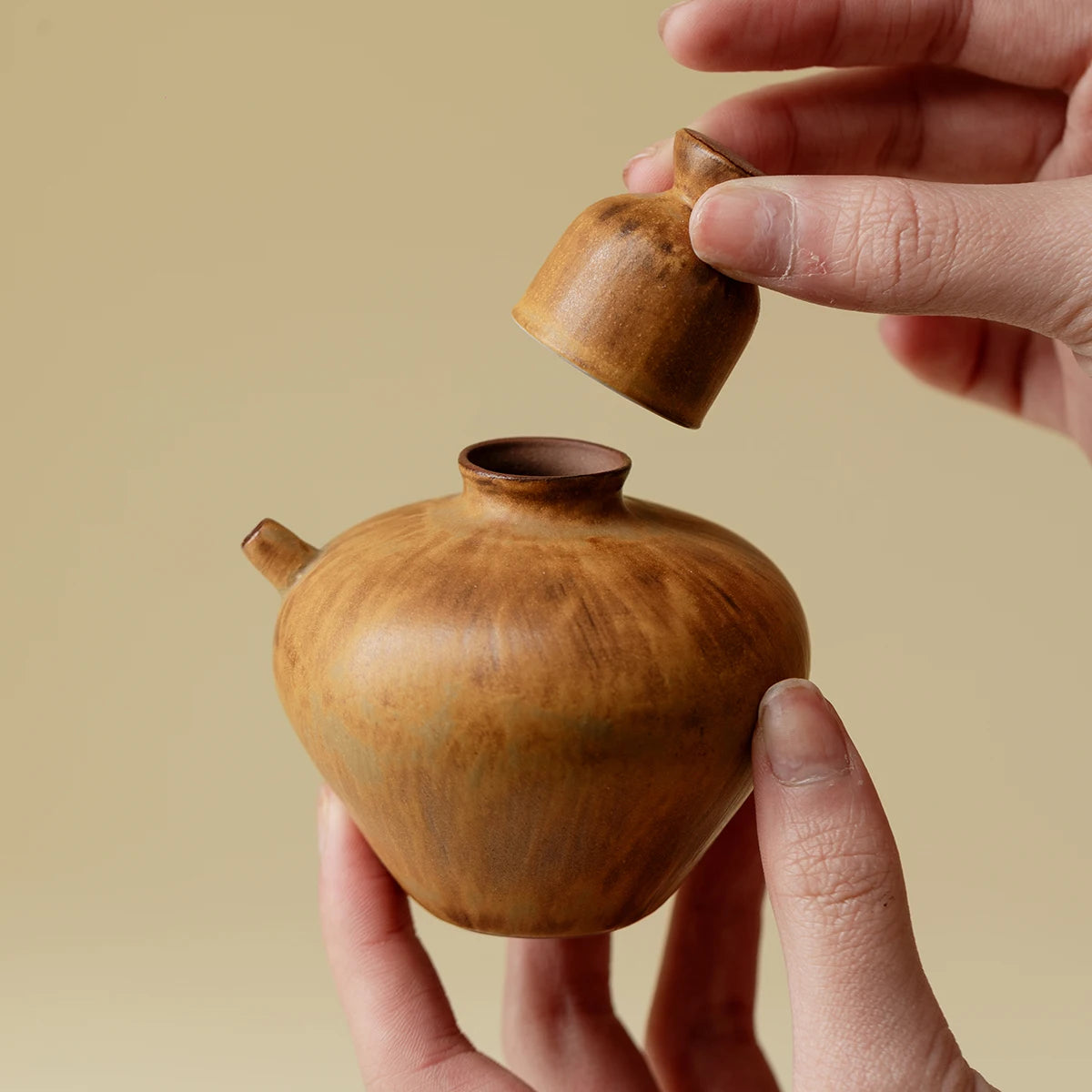A Set of Simple Earthenware Drinking Utensils for One Person A Decanter A Ceramic Kiln-changed Wine Pot and Wine Cups Oasis Select