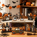 Halloween wooden dining table decoration, with patterns of fairies, trucks, ghosts, bicycles, etc. on the decorations. Oasis Select Default Title