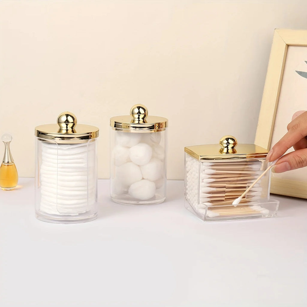1/3 Qtips Bathroom Organizer with a gold lid, a 10 oz. ball filler and a clear plastic apothecary jar for cotton swabs Oasis Select