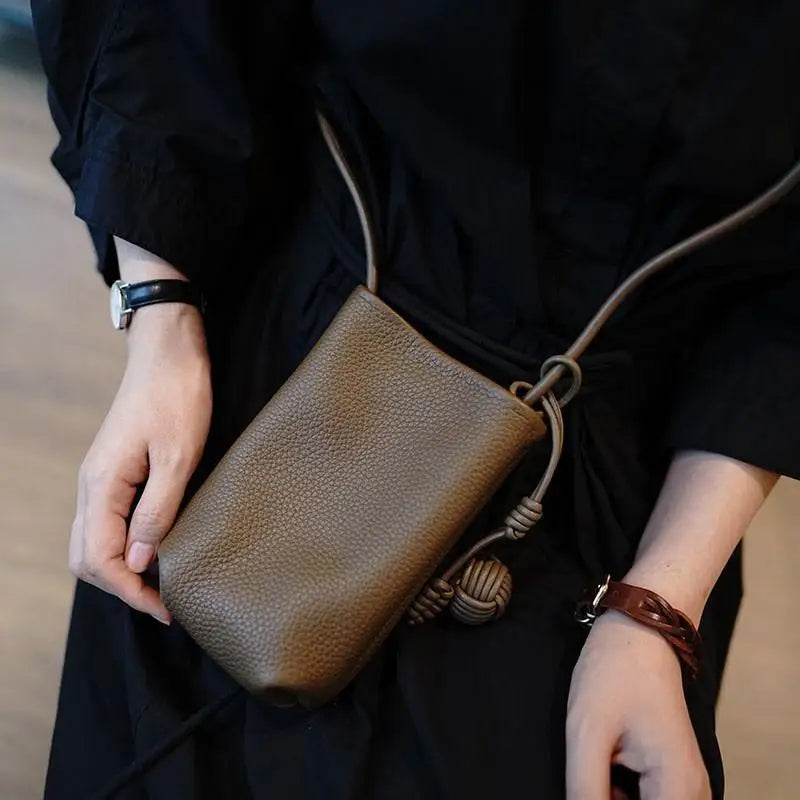 Women's Mini PU Leather Crossbody Phone Bag with Ball Pendant
