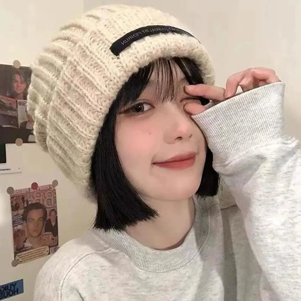 Autumn and winter warm knit hat new hat, women's pile pile ear protection yarn hat, versatile, small face, big head circumferen Oasis Select
