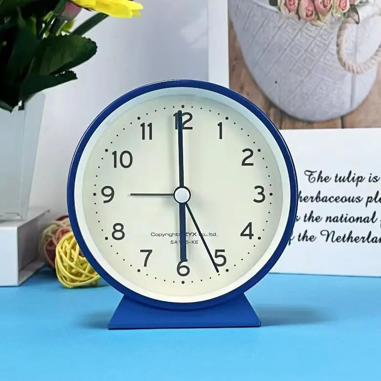 A Cute and Simple Round Bedside Table with A Clock Timer and A Small Student Alarm Clock Oasis Select blue