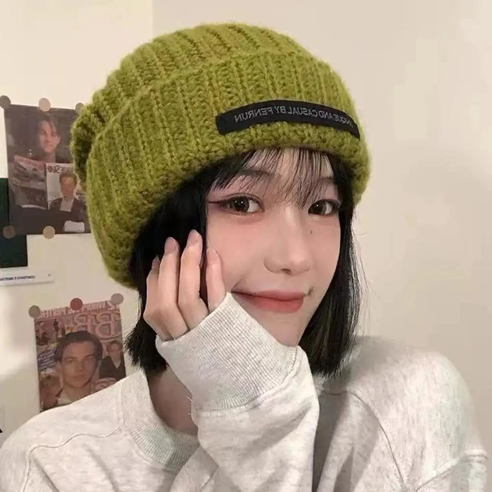 Autumn and winter warm knit hat new hat, women's pile pile ear protection yarn hat, versatile, small face, big head circumferen Oasis Select
