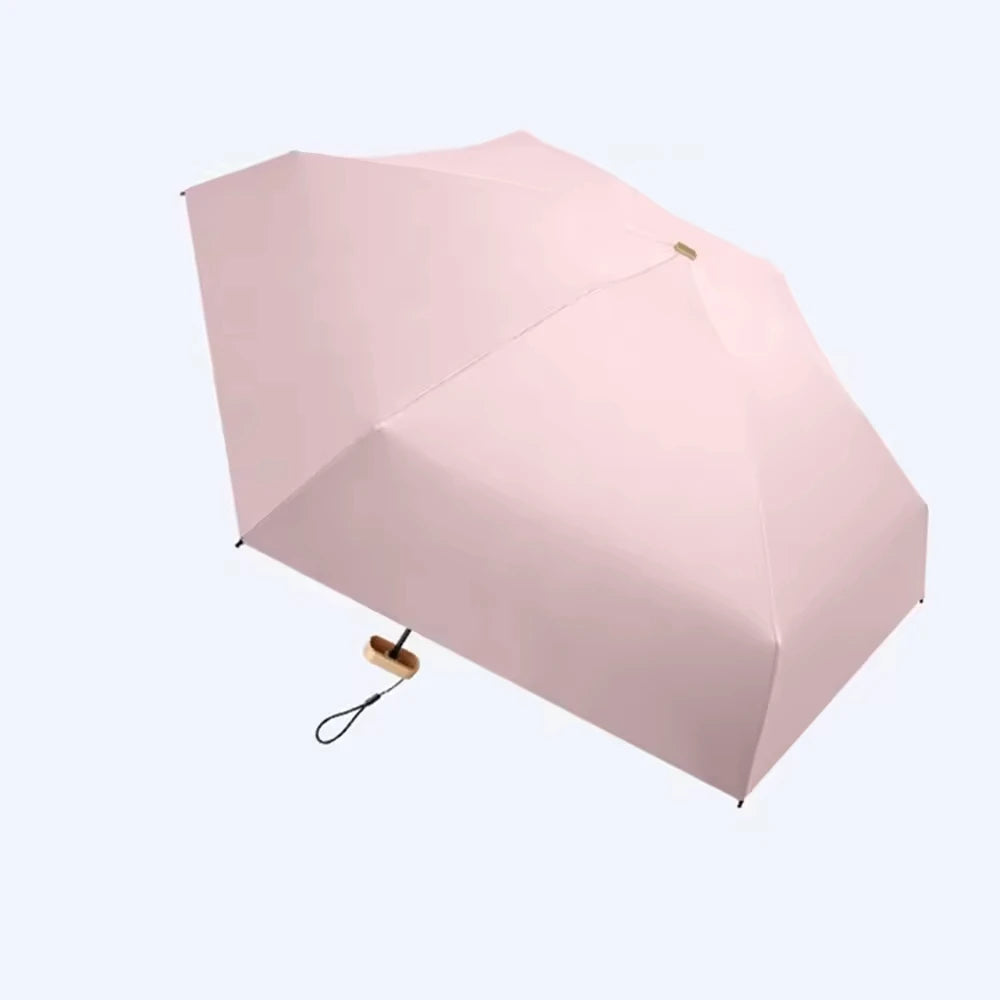 1Pc 55% Off Mini Sun Umbrella Pocket Rain Umbrella Vinyl Folding UV Ultraviolet Protection Sun Shade Pocket Parasol Capsule Oasis Select MULTI 6K iron