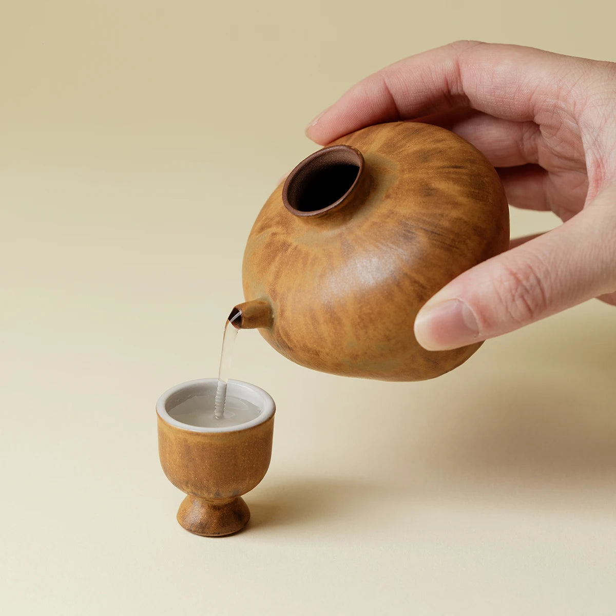 A Set of Simple Earthenware Drinking Utensils for One Person A Decanter A Ceramic Kiln-changed Wine Pot and Wine Cups Oasis Select