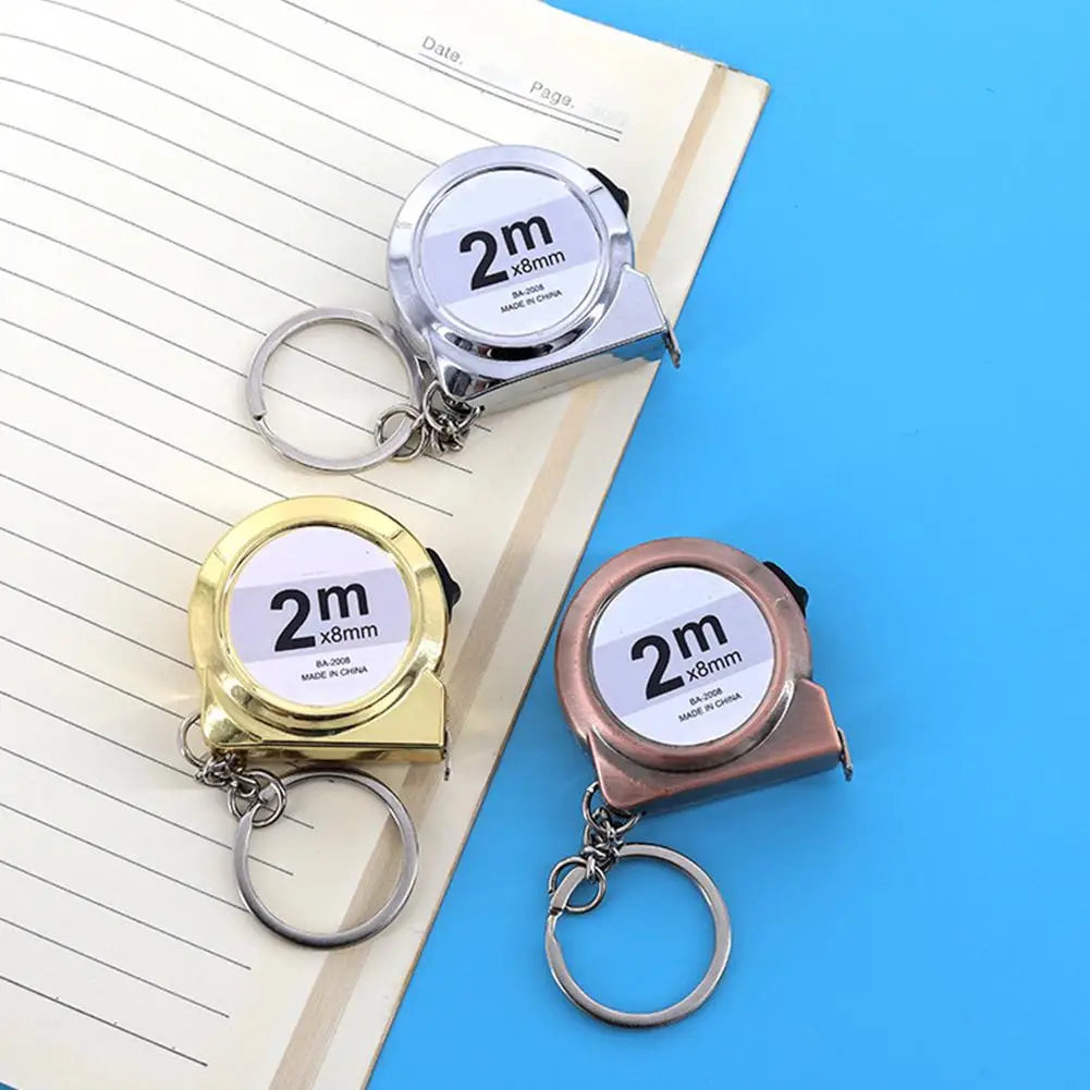 Snail Mini Tape Measure Keychain – 2M Dual-Scale Steel Ruler