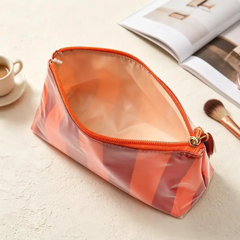 Waterproof Striped PVC Cosmetic Bag with Tassel Zipper