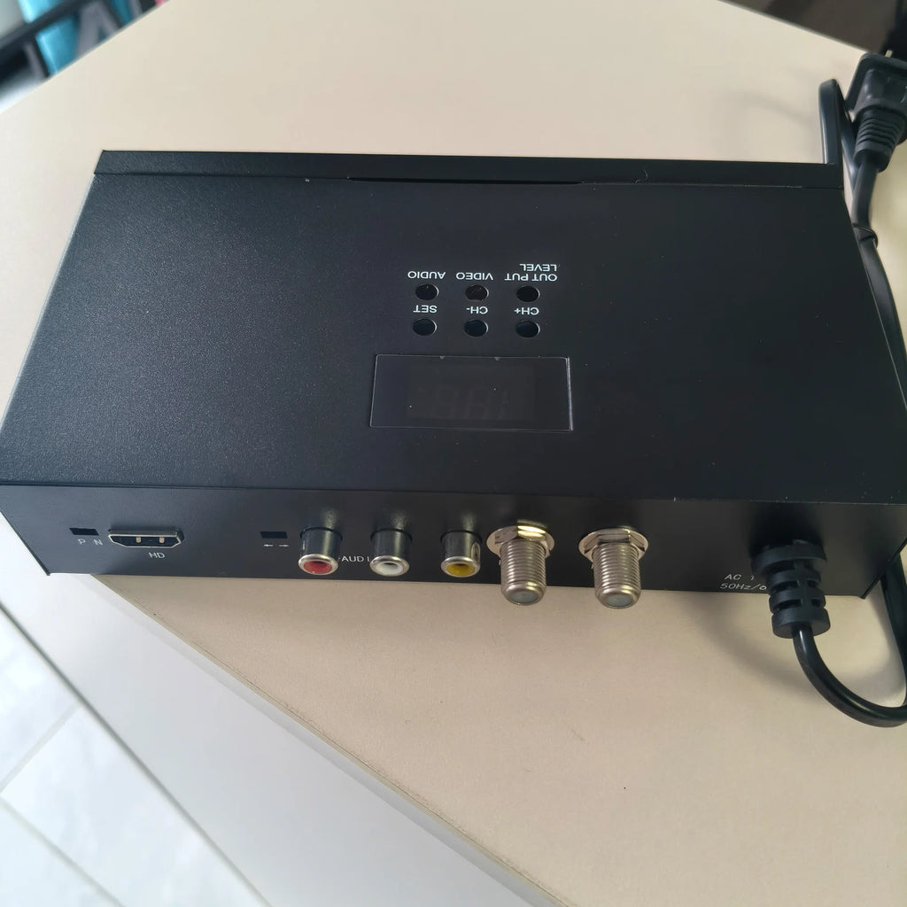 Single-channel HD/SD/AV-to-RF analog TV modulator for PAL, NTSC, and SECAM in-house programming; frequency adjustable Oasis Select