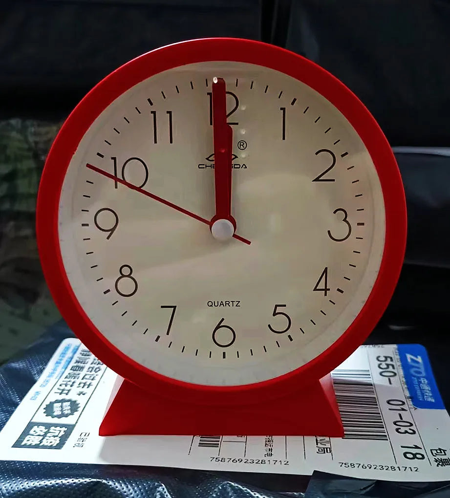 A Cute and Simple Round Bedside Table with A Clock Timer and A Small Student Alarm Clock Oasis Select red