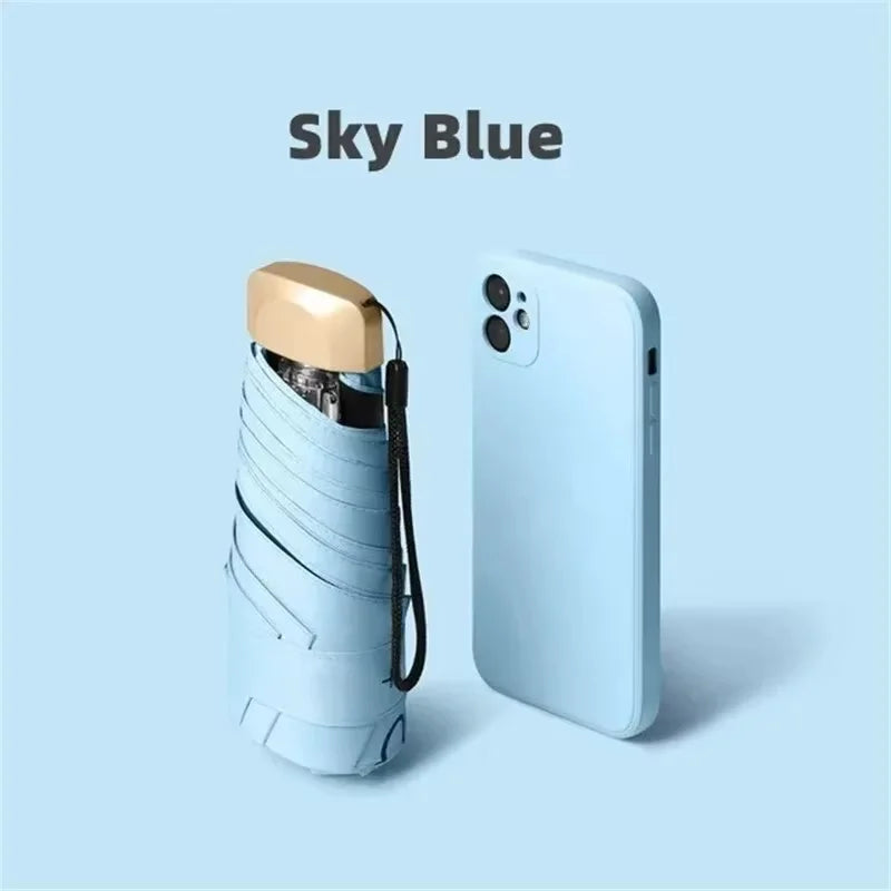 1Pc Mini Sun Umbrella Pocket Rain Umbrella Vinyl Folding UV Protection Sun Shade Ultraviolet Capsule Parasol for Pocket 55% off Oasis Select 1pc sky blue 6K iron