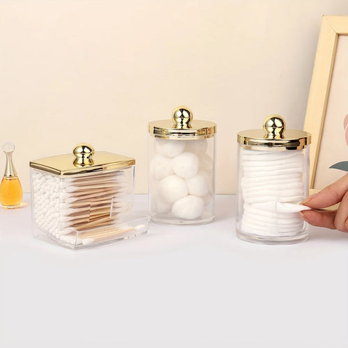 1/3 Qtips Bathroom Organizer with a gold lid, a 10 oz. ball filler and a clear plastic apothecary jar for cotton swabs Oasis Select