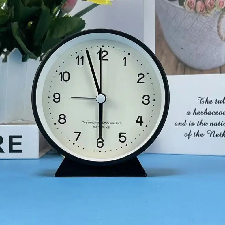 A Cute and Simple Round Bedside Table with A Clock Timer and A Small Student Alarm Clock Oasis Select black