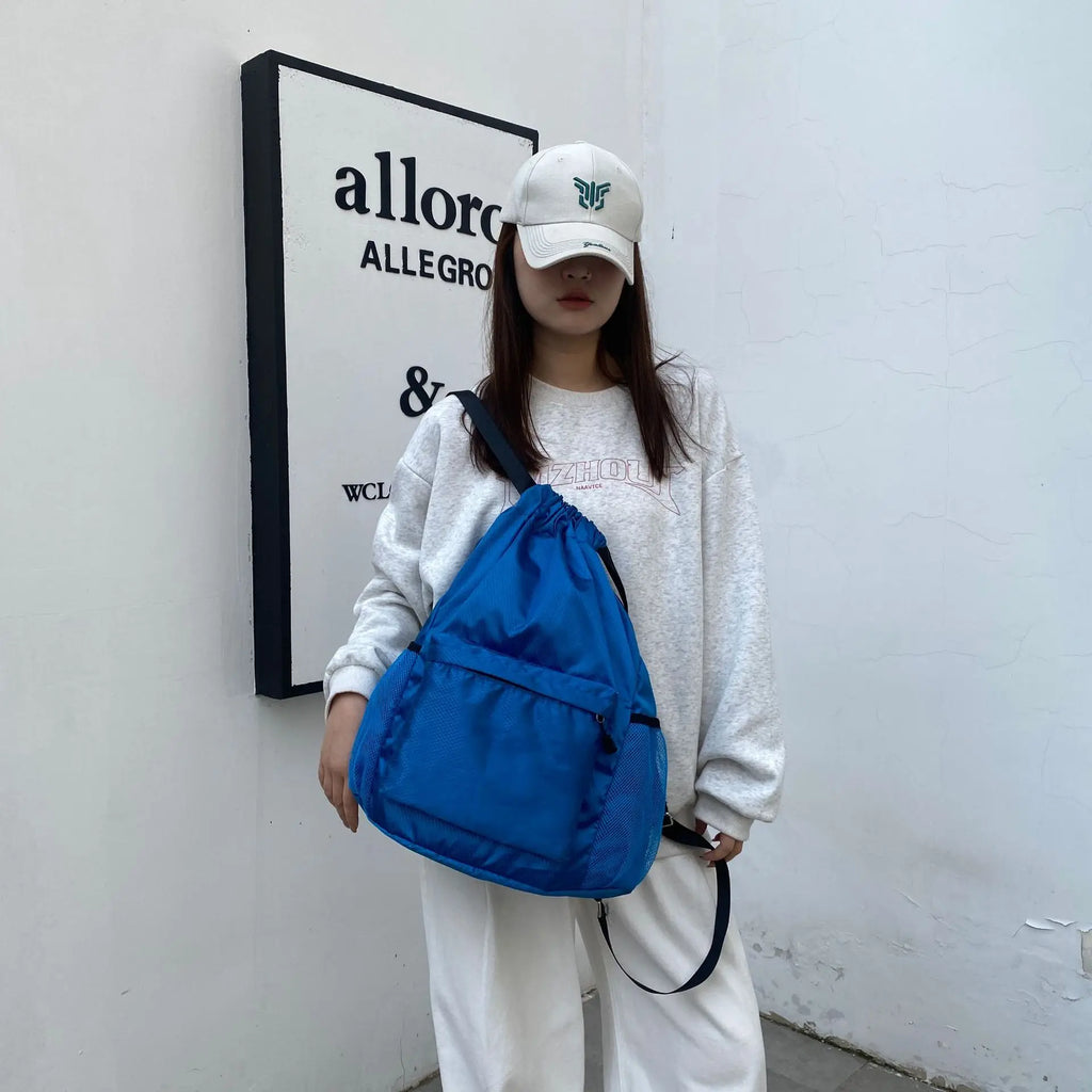 Water Resistant Nylon Drawstring Sports Backpack with Tassel Zipper Utility Pocket Lightweight Gym Sack for Travel Outdoor Oasis Select