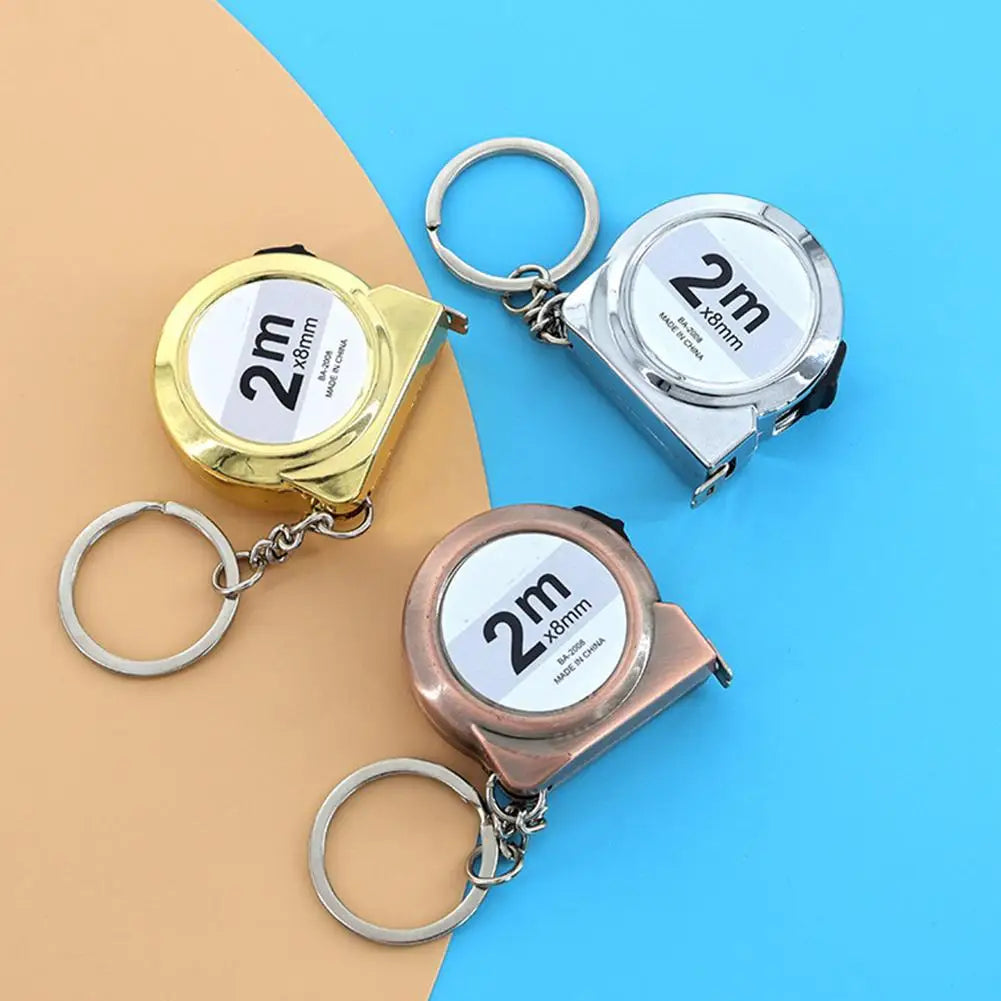 Snail Mini Tape Measure Keychain – 2M Dual-Scale Steel Ruler