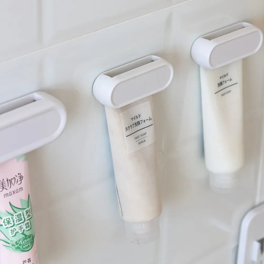 Adhesive Bathroom Organizer No Drill Toothpaste Holder Wall Mounted Storage Clip for Tubes and Facial Cleanser Bottles Oasis Select