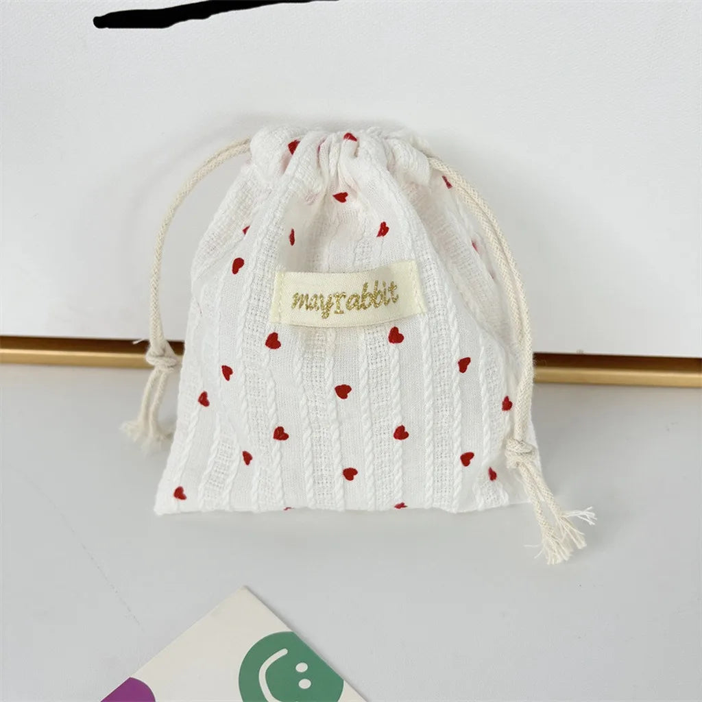 A large capacity vertical striped heart-shaped storage bag-a cute oval-shaped storage bag with sweet stripes,suitable for travel Oasis Select