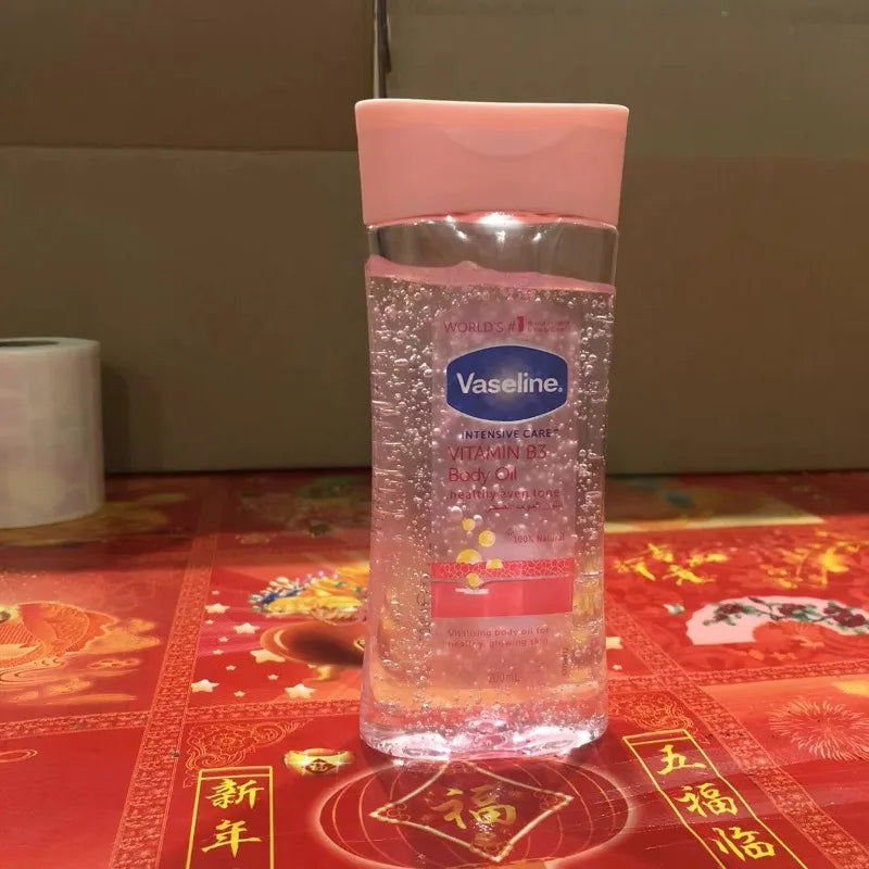 Vaseline UV Extra Brightening Body Lotion with GLUTA-HYA Vitamin B3 & Cocoa Body Oil for Skin Moisturizing Oasis Select pink 200ml Oil