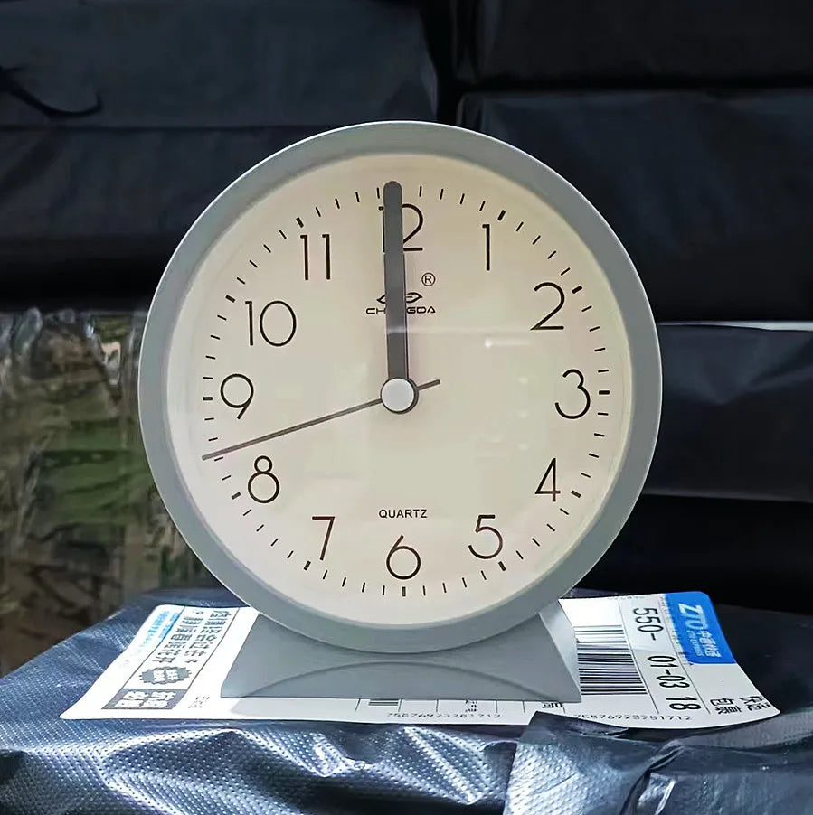 A Cute and Simple Round Bedside Table with A Clock Timer and A Small Student Alarm Clock Oasis Select grey