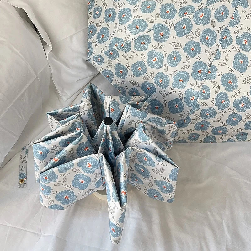 Blue floral automatic umbrella black vinyl dual-use for sunny and rainy sun protection UV protection folding portable umbrella. Oasis Select