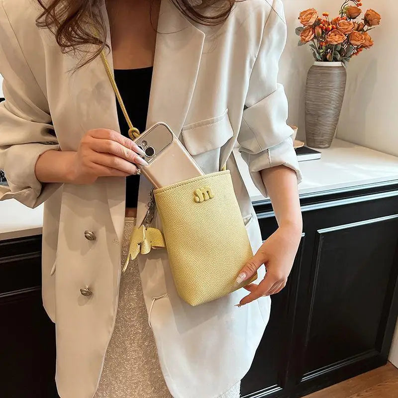Women's Mini PU Leather Crossbody Phone Bag with Ball Pendant