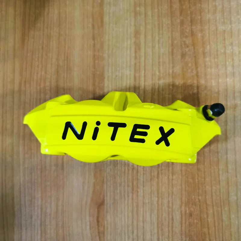 M40 motorcycle CNC modified pump forging 100MM high radiation four piston integrated caliper Oasis Select green