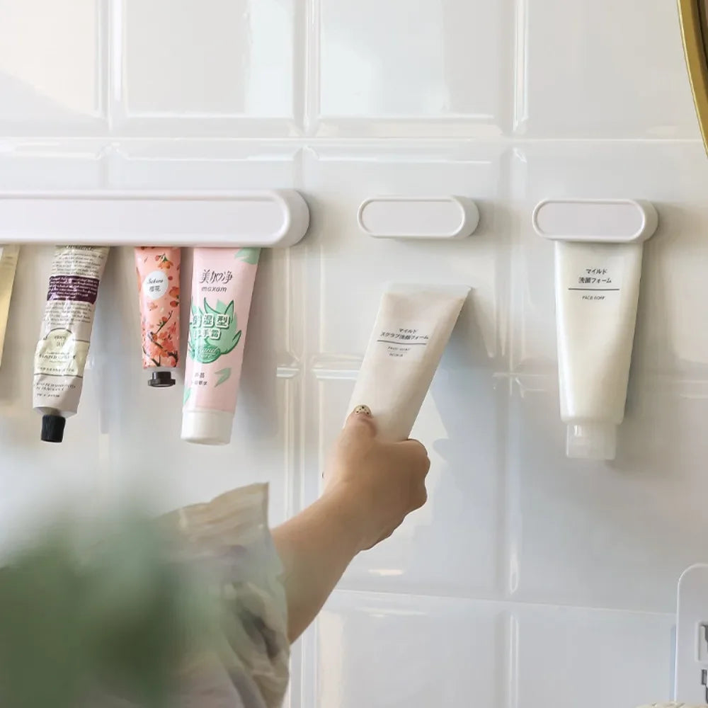 Adhesive Bathroom Organizer No Drill Toothpaste Holder Wall Mounted Storage Clip for Tubes and Facial Cleanser Bottles Oasis Select