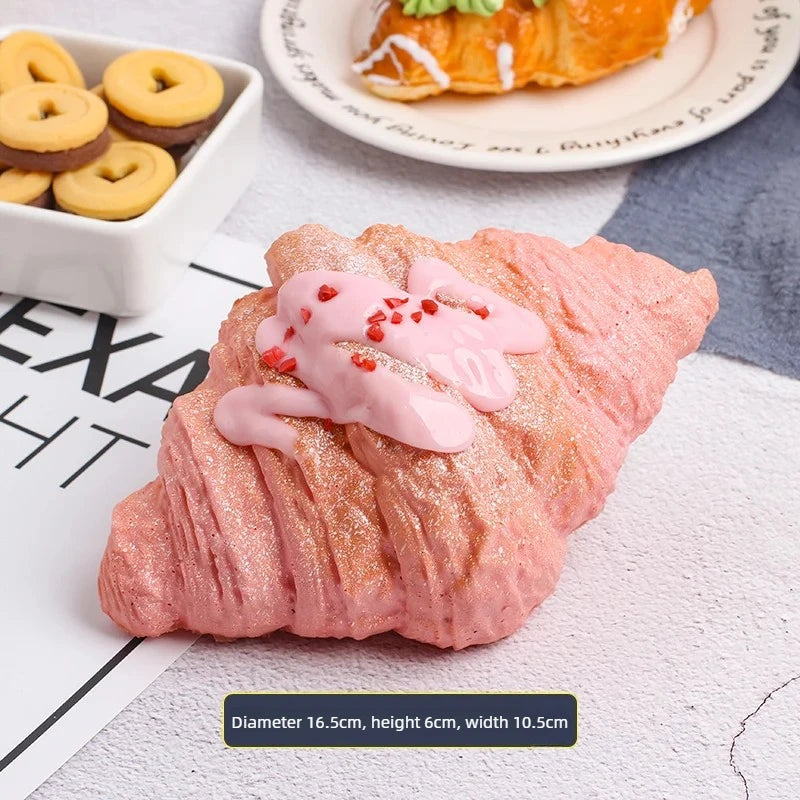 Simulated Croissant Squishy Slow Rising Toy, Scented Bread Stress Relief Model Food Prop Fidget Toy Vent and Decompress Oasis Select Ode to pink