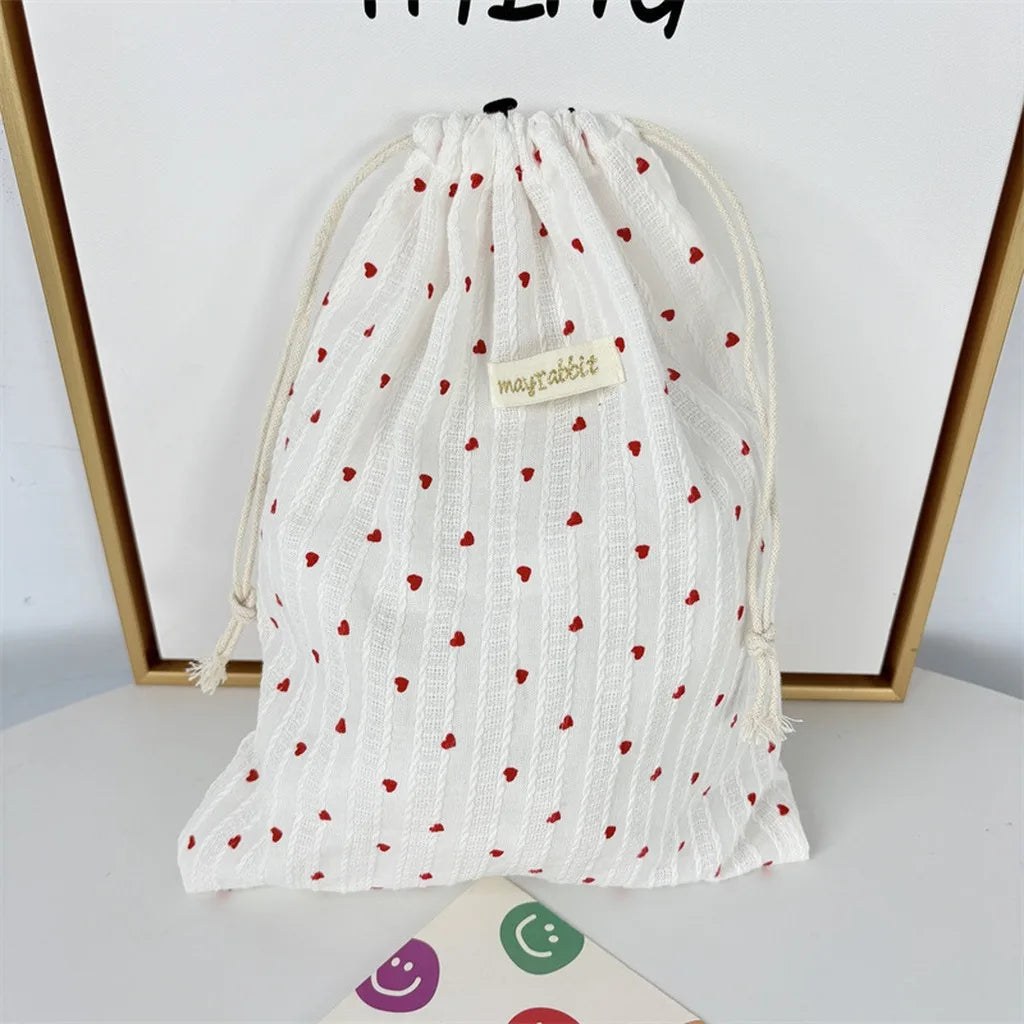A large capacity vertical striped heart-shaped storage bag-a cute oval-shaped storage bag with sweet stripes,suitable for travel Oasis Select