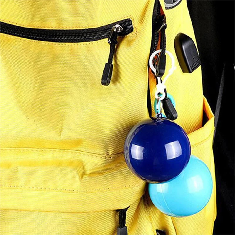 Portable disposable raincoat for adults with compressible spherical keychain and pockets can be hung suitable for outdoor travel Oasis Select