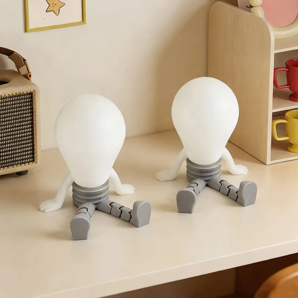 Glowing Light Bulb Shaped Human Figurine Movable Joint Luminous Mini Statue Creative Desk Car Decor Ornament Unique Gift Oasis Select