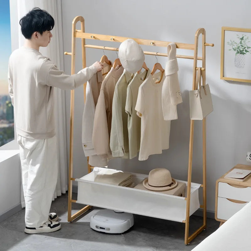 Hanging clothes shelves are placed at the end of the bedroom bed, and clothes artifacts are placed at night Oasis Select