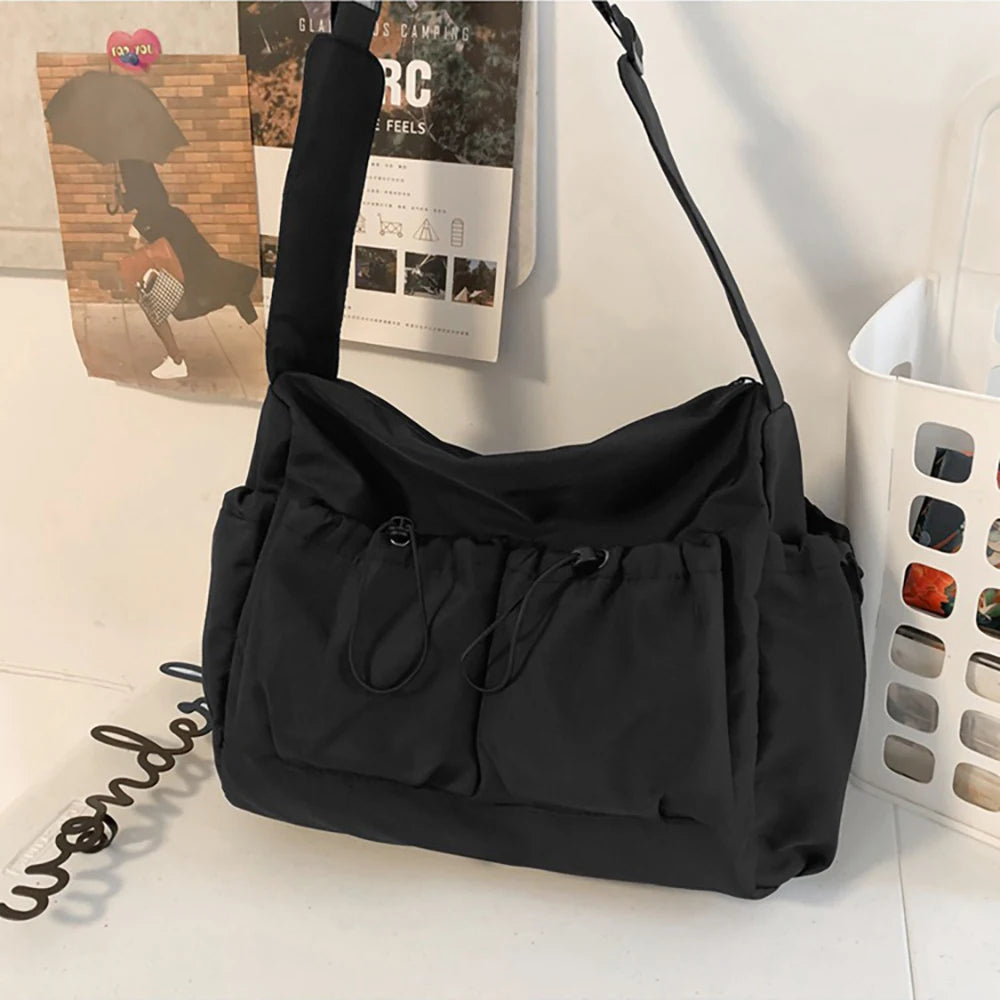 Drawstring crossbody bag, large capacity shoulder bag, fashion zipper bag, men's and women's universal, applicable to school Oasis Select black