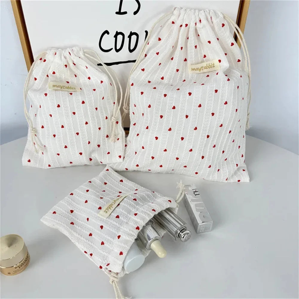 A large capacity vertical striped heart-shaped storage bag-a cute oval-shaped storage bag with sweet stripes,suitable for travel Oasis Select