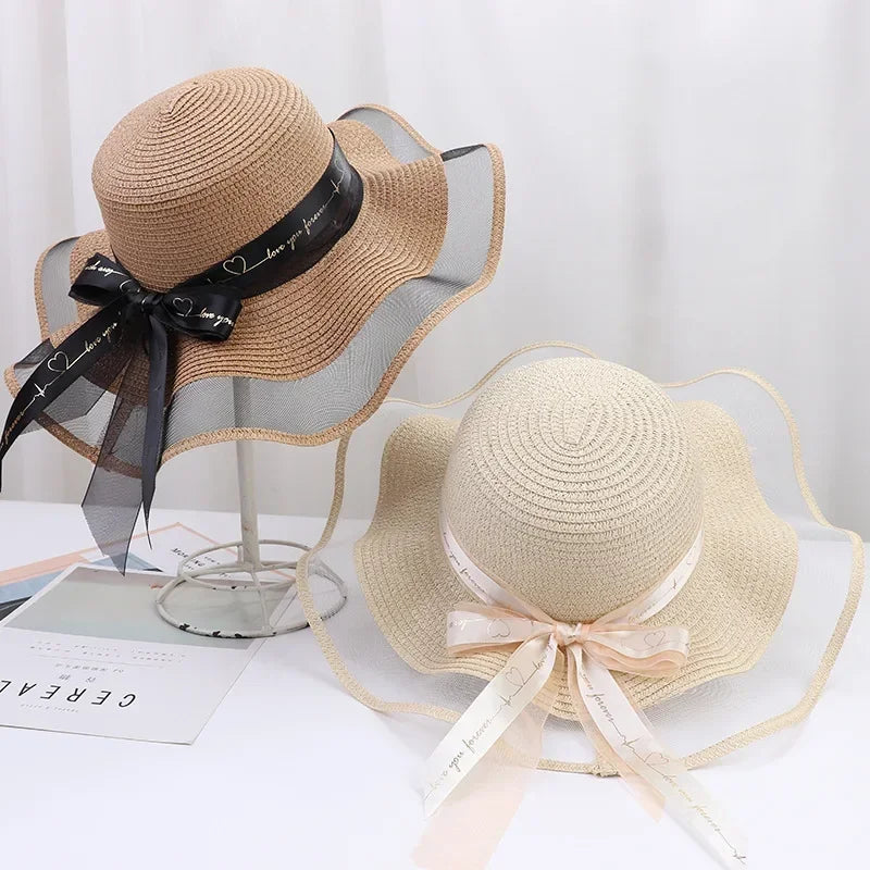 Elegant Wide Brim Sun Hat with Bowknot - UV Protection, Breathable Straw Beach Cap for Women, Perfect for Outdoor Leisure Oasis Select