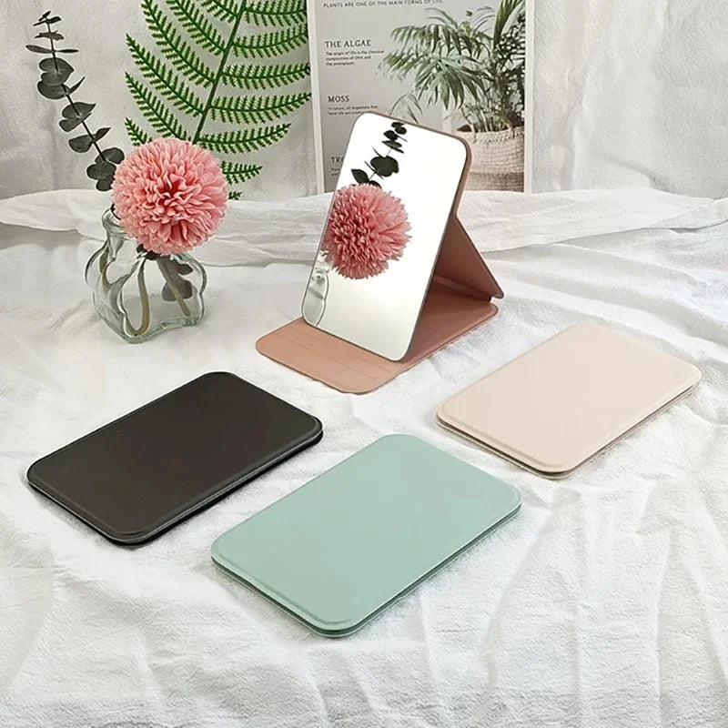 Woman MINI Folding Makeup Mirror High-quality Portable Pocket Makeup Mirror Single-side Creative Women Solid Color Handle Desk Oasis Select