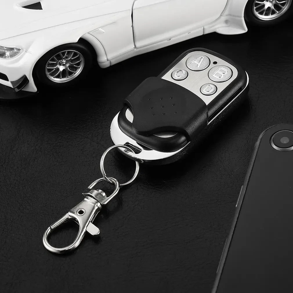 Universal 4 Buttons Garage Door Opener Remote Control 433MHz Clone Fixed Learning Rolling Code Duplicator Garage Metal Remote Oasis Select