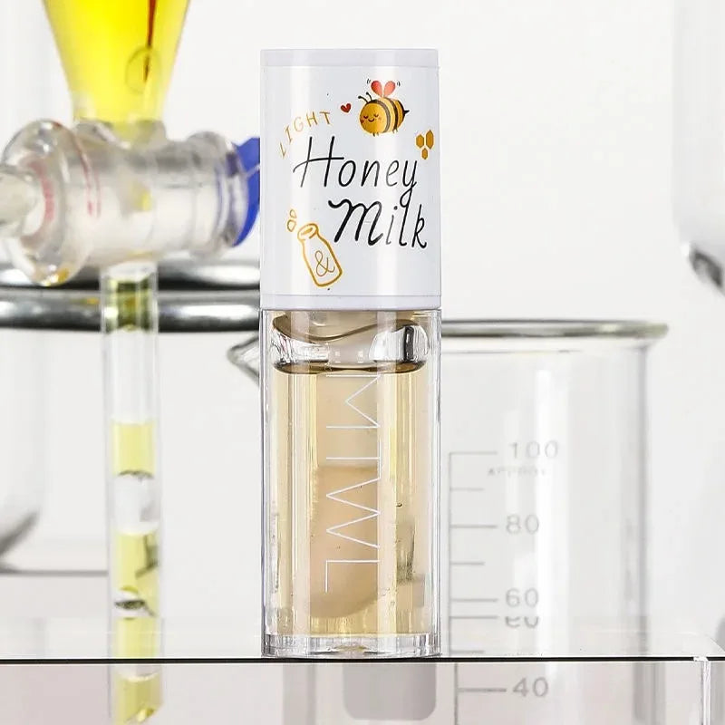White Peach And Honey Lip Oil Soothes Dry Moisturizes And Does Not Fade Lovely Big Brush Head Lip Gloss Oasis Select Honey Milk