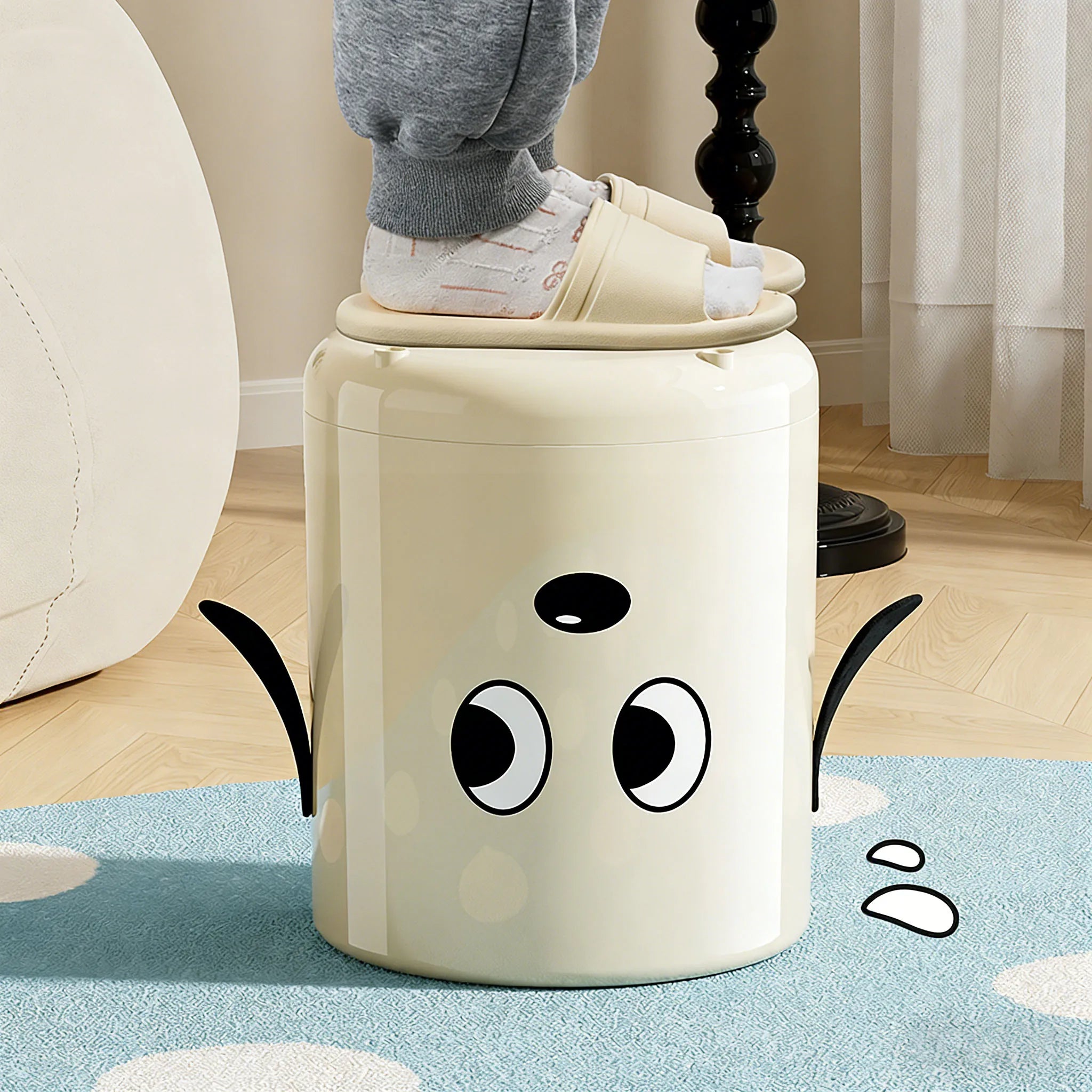 A trash can with wheels. Features a cute cartoon dog design. Practical and serves as a home decor item. Oasis Select